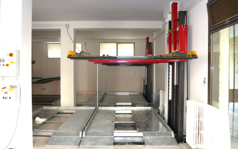 Elevatore per box auto Fimac Lift H-Box con sistema di sollevamento a doppia colonna
